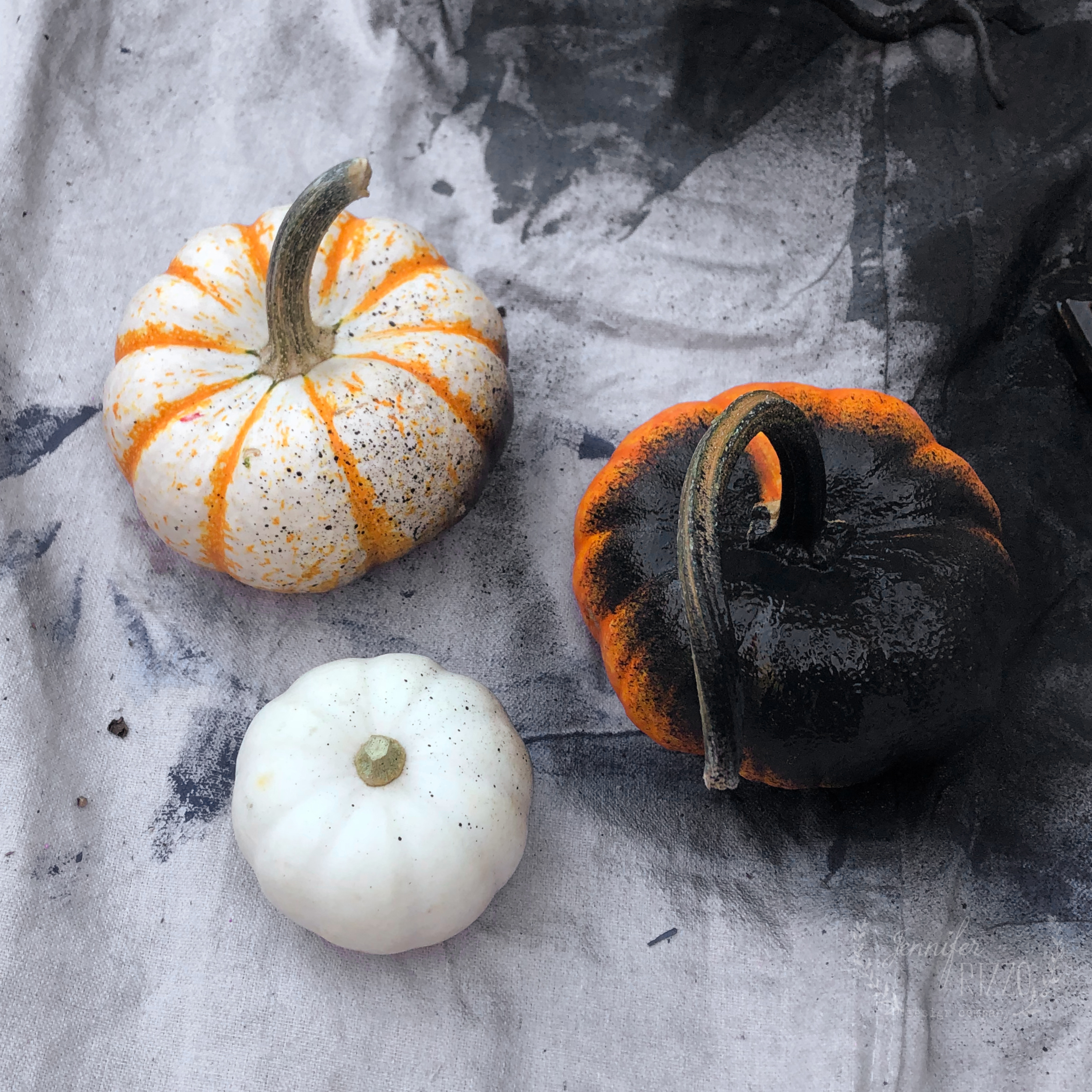 Learn how to paint Halloween decorations using a HomeRight paint sprayer. The sprayer makes it easy to paint twisty branches and fall pumpkins!