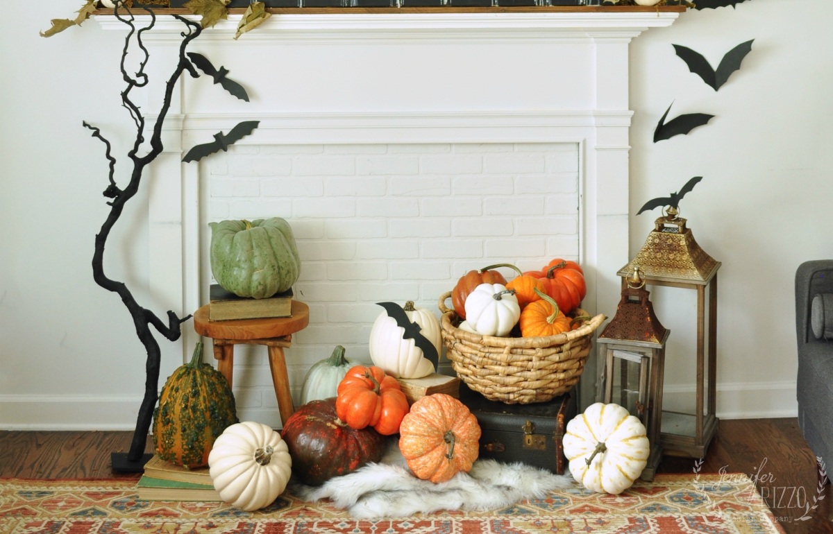 Learn how to paint Halloween decorations using a HomeRight paint sprayer. The sprayer makes it easy to paint twisty branches and fall pumpkins!