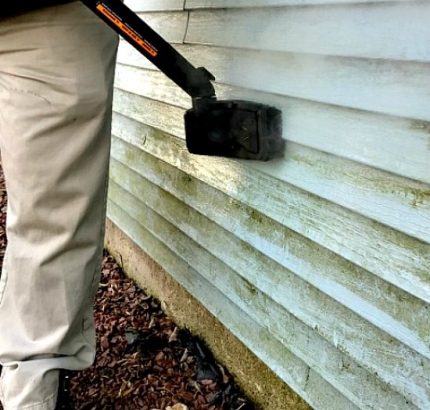 Close up of angle for steam cleaning siding