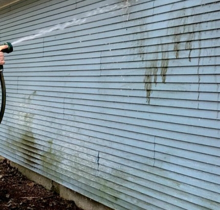hosing off siding after steam cleaning