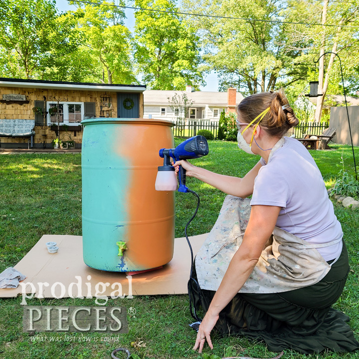 painting rain barrel