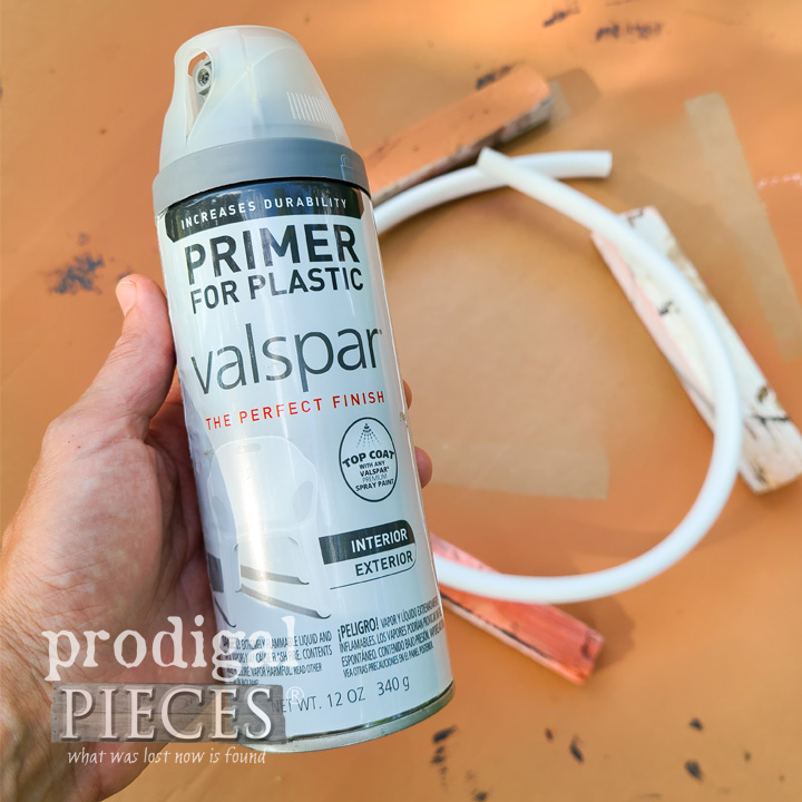 spraying plastic primer